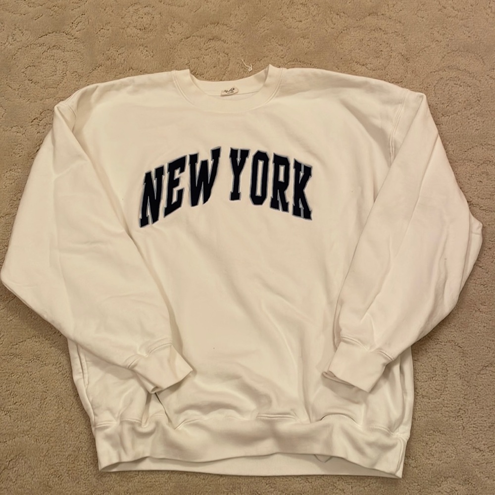 Brandy Melville white “New York” Cree Neck